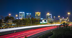 Birmingham, Alabama city skyline and highway traffic trails Birmingham, Alabama city skyline and highway traffic trails