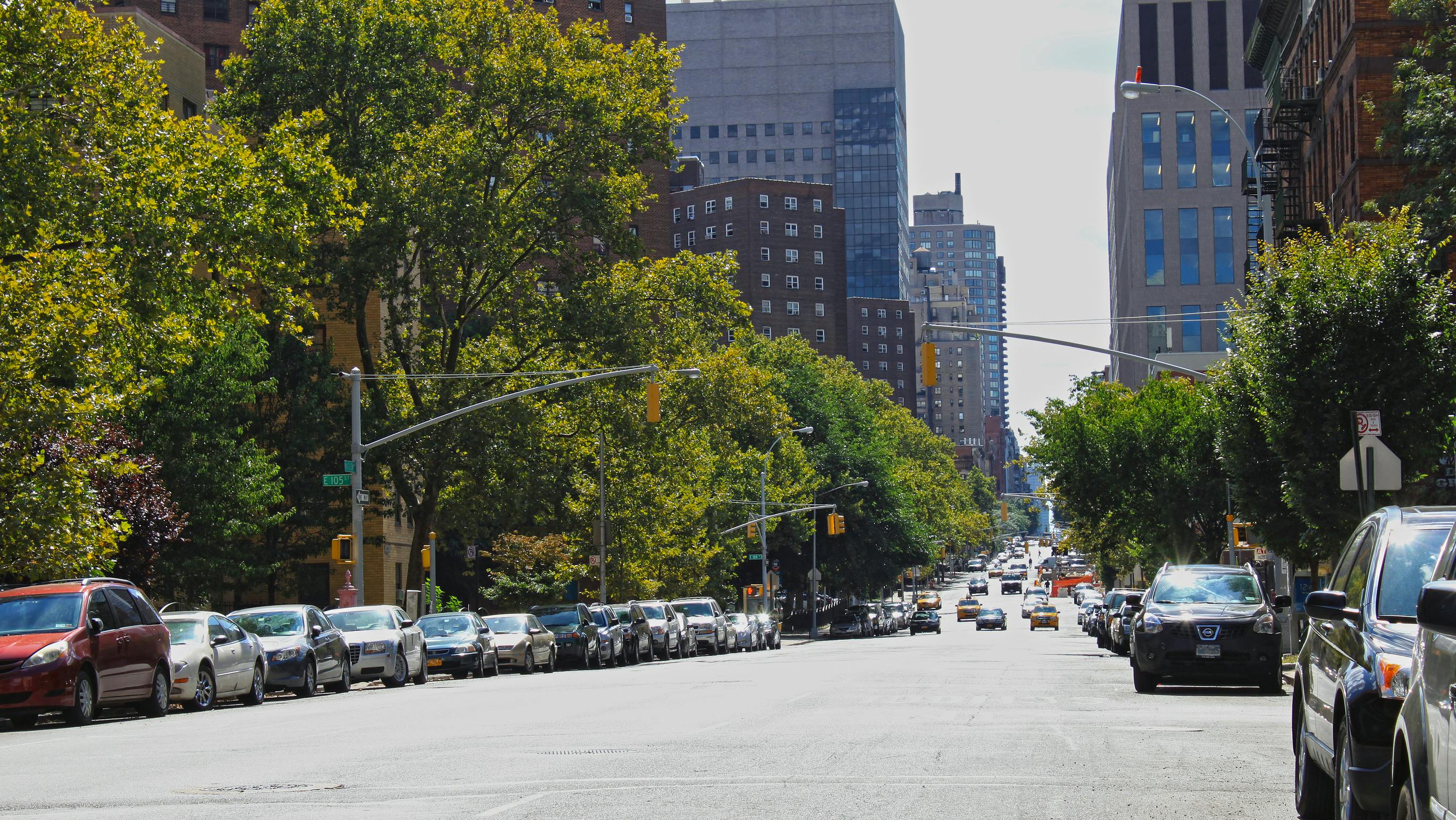 Cars parked along 105th Street in New York City, New York.
