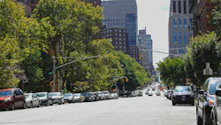 Cars parked along 105th Street in New York City, New York. Cars parked along 105th Street in New York City, New York.