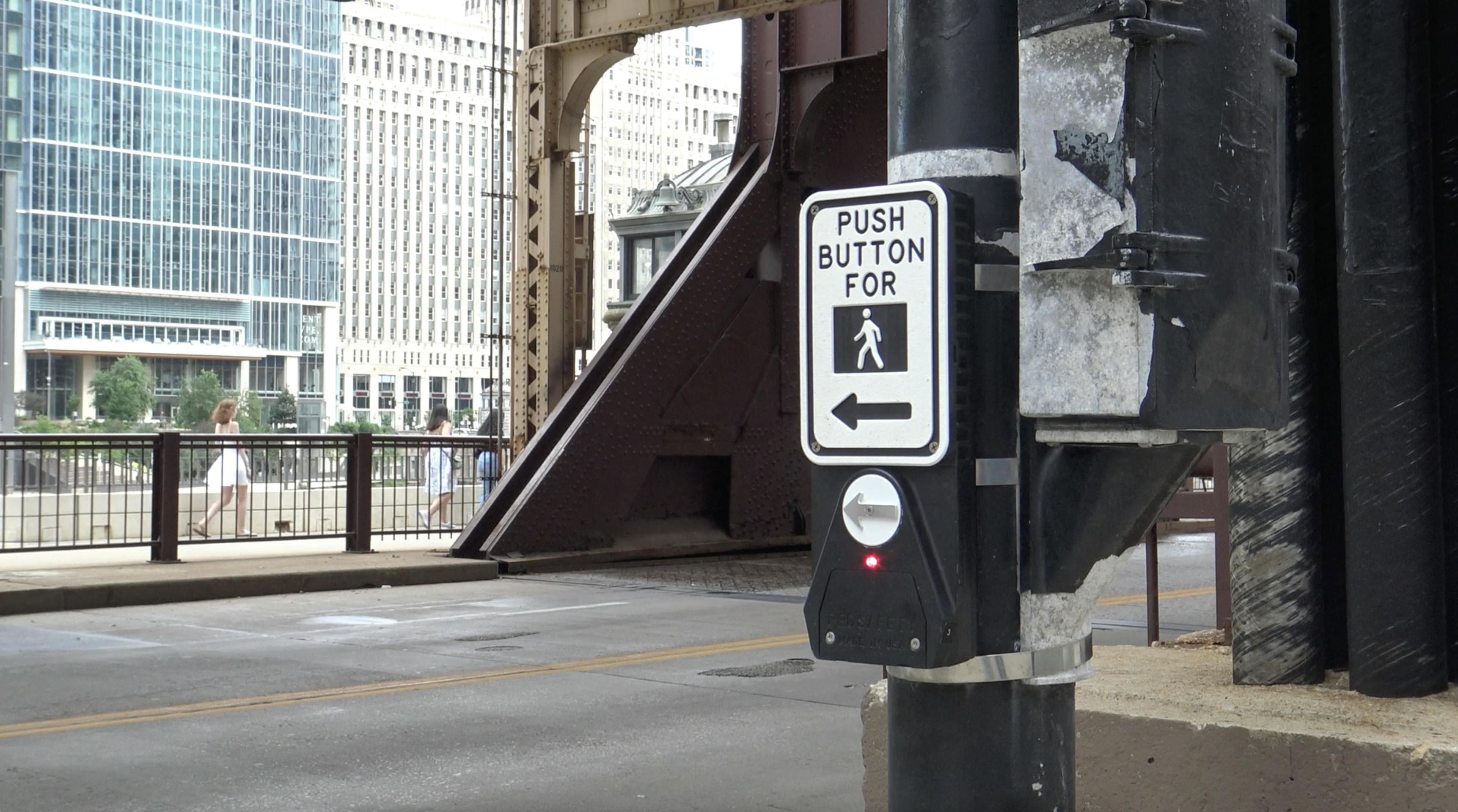 An accessible pedestrian signal at a crossing near the Ogilvie Transportation Center in Chicago, Illinois.