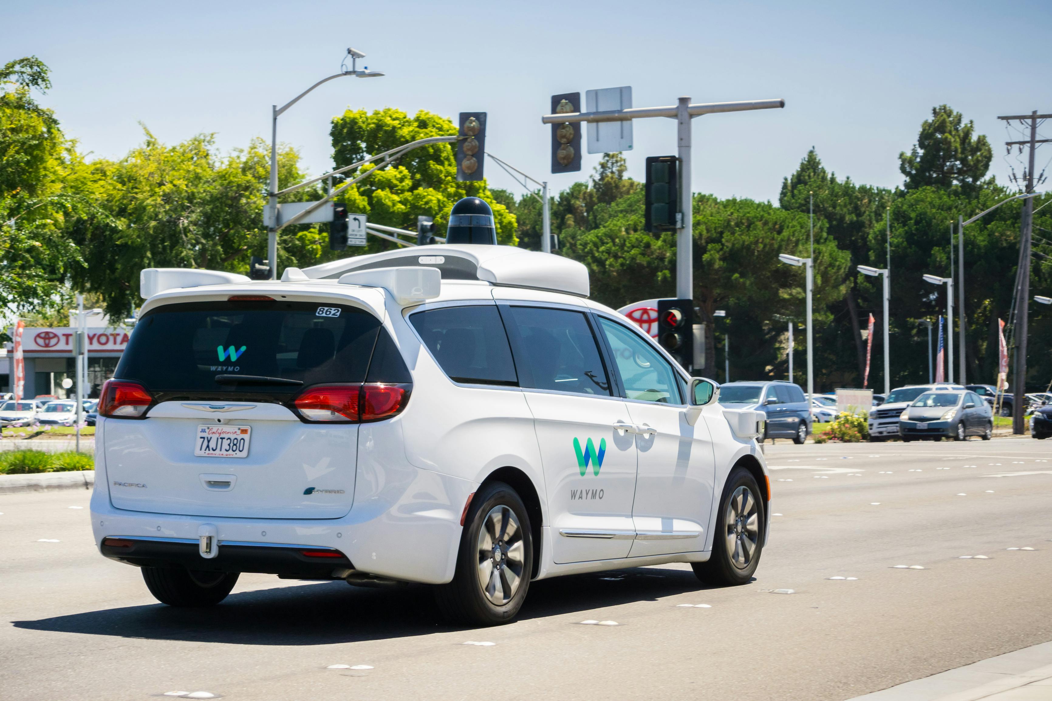 A Waymo robotaxi riding through Silicon Valley.