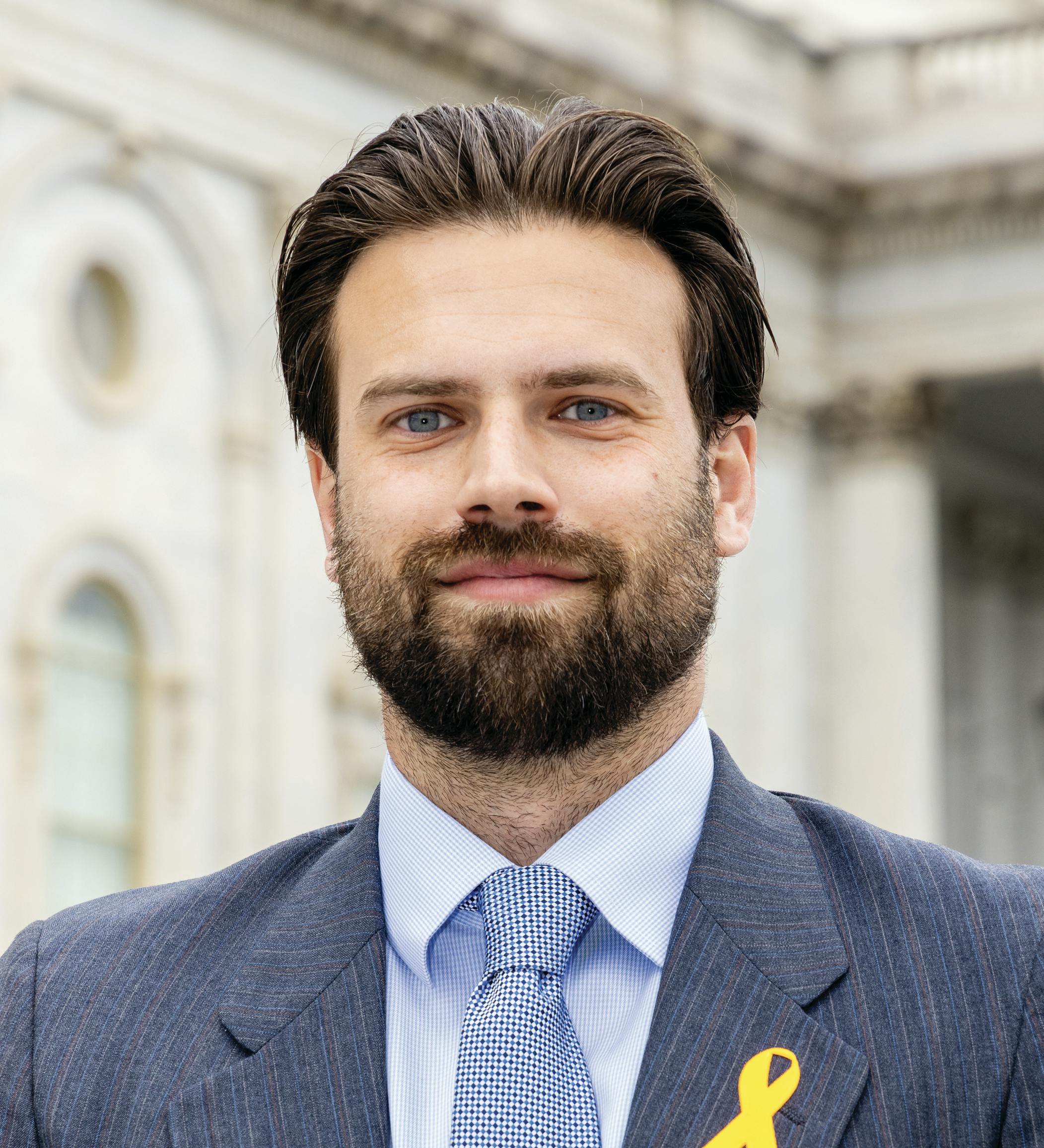 Cameron Greene's headshot.