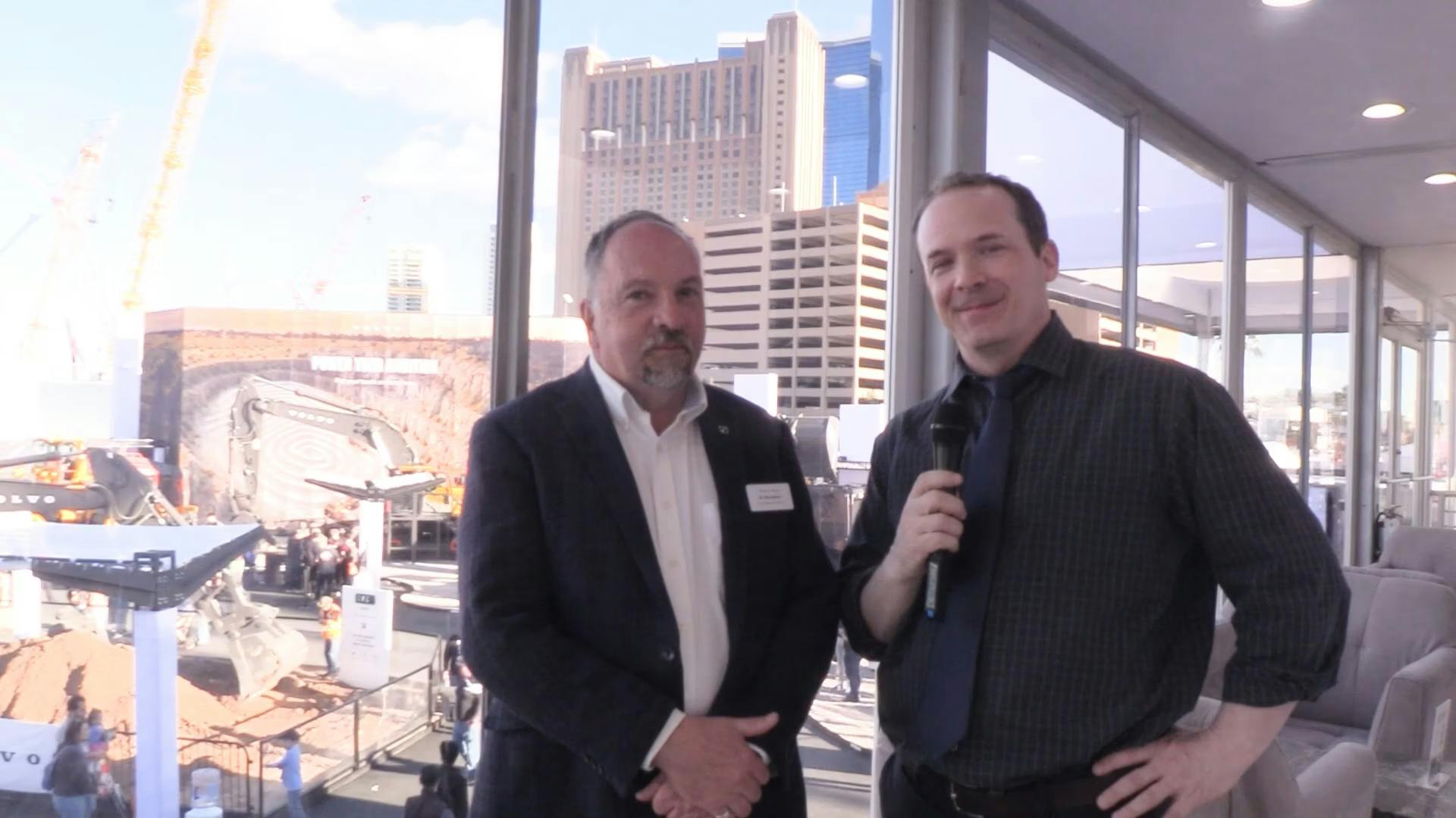 Ray Gallan From Volvo Talks With Roads & Bridges Head Of Content Gavin Jenkins At Conexpo