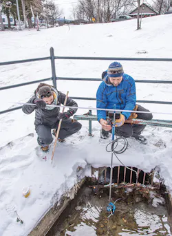 Corey Laxson and Elizabeth Yerger from the Paul Smith’s College Adirondack Watershed Institute measuring discharge at the outlet of Mirror Lake. Corey Laxson and Elizabeth Yerger from the Paul Smith’s College Adirondack Watershed Institute measuring discharge at the outlet of Mirror Lake.