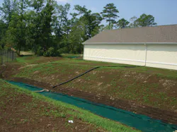 A stream bank restoration at Camp Lejeune leading to a retention pond. The project used erosion control socks with McGill SoilBuilder Premium Compost. A stream bank restoration at Camp Lejeune leading to a retention pond. The project used erosion control socks with McGill SoilBuilder Premium Compost.