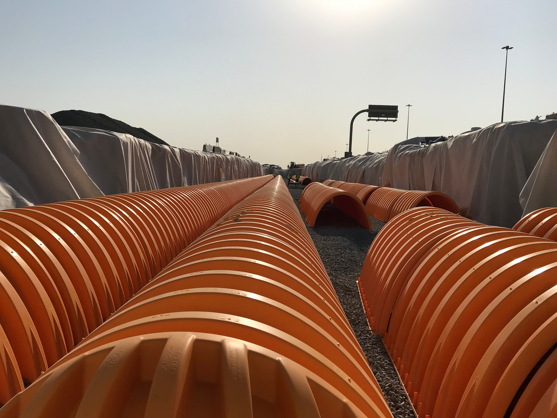 The system of arch-shaped chambers in multiple tanks was buried with up to 3.96 meters (13 feet) of cover.