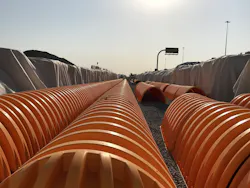 The system of arch-shaped chambers in multiple tanks was buried with up to 3.96 meters (13 feet) of cover. The system of arch-shaped chambers in multiple tanks was buried with up to 3.96 meters (13 feet) of cover.