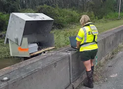 Lori Lewis, USGS hydrologic technician, verifies the readings of a USGS streamgage located on Bayou Marcus in Pensacola, FL, on September 17, 2020. Lori Lewis, USGS hydrologic technician, verifies the readings of a USGS streamgage located on Bayou Marcus in Pensacola, FL, on September 17, 2020.