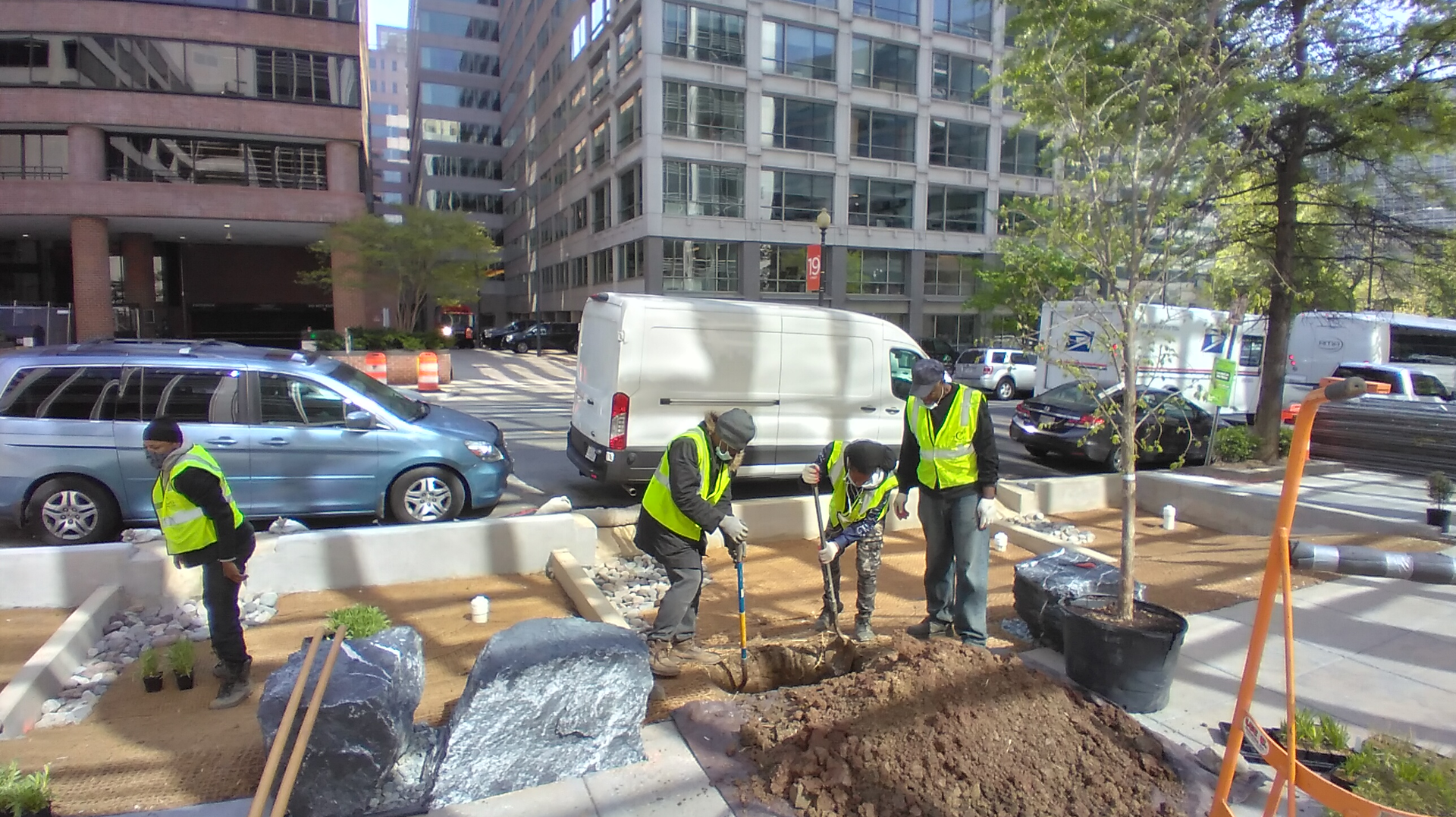 TCG Property Care employees working on the Golden Triangle Project in Washington, D.C., which included 11 new rain gardens and 10 expanded tree boxes. TCG Property Care won a number of successful project bids thanks to their participation in the Clean Water Project&rsquo;s business development programs.