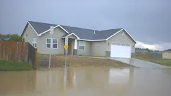 Failing infiltration systems caused street flooding in Yakima, Wash. Failing infiltration systems caused street flooding in Yakima, Wash.