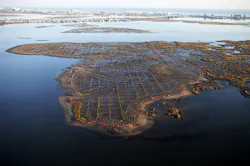 Aerial photo of the Yellow Bar marsh island restoration project in Jamaica Bay, New York. Aerial photo of the Yellow Bar marsh island restoration project in Jamaica Bay, New York.