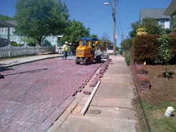 1654812262841 Machinelayingpaversalongcrumley 1654812262841 Machinelayingpaversalongcrumley