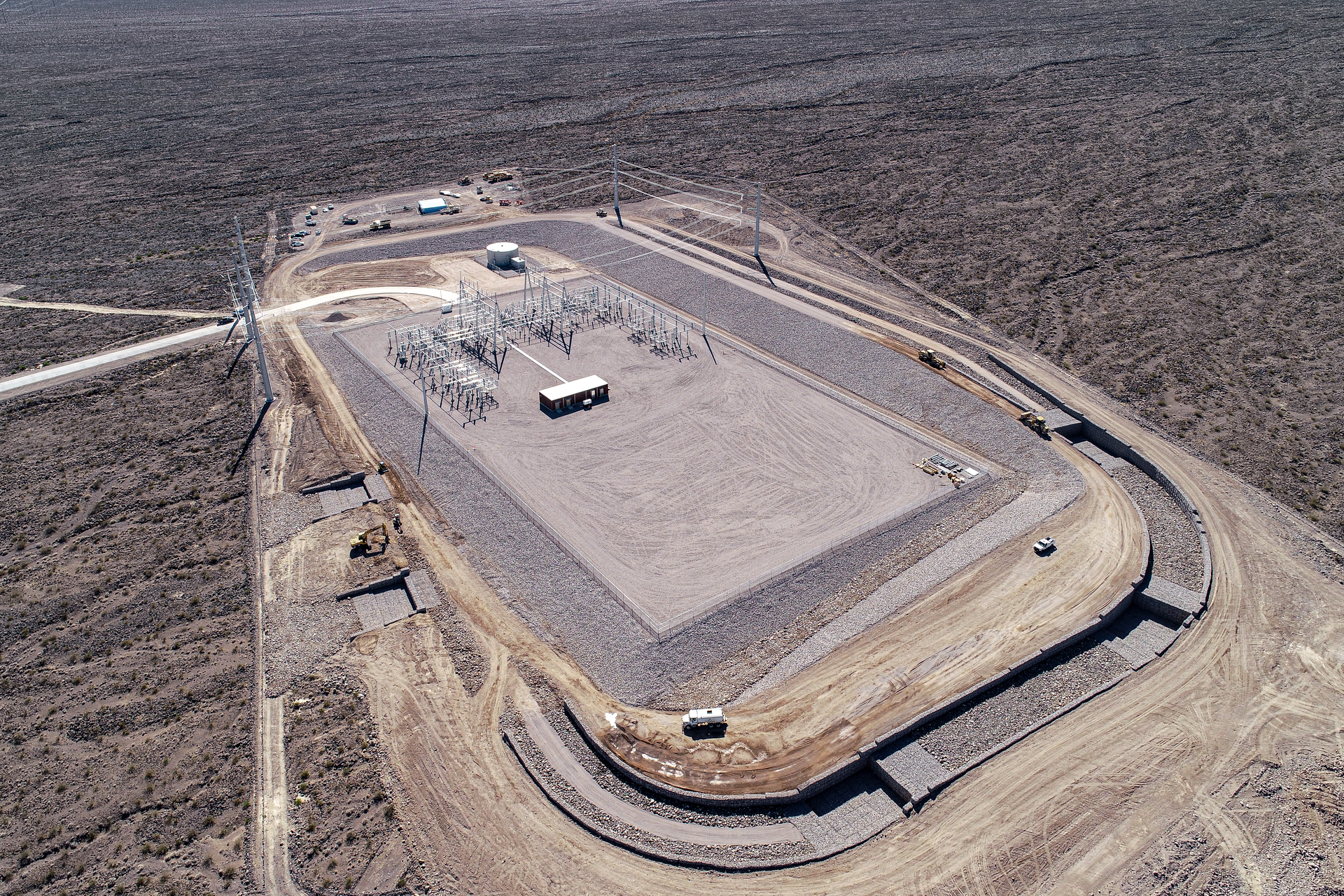 A hydraulic channel was needed to divert and protect from the rainstorm water coming from Sloan Canyon Mountains.