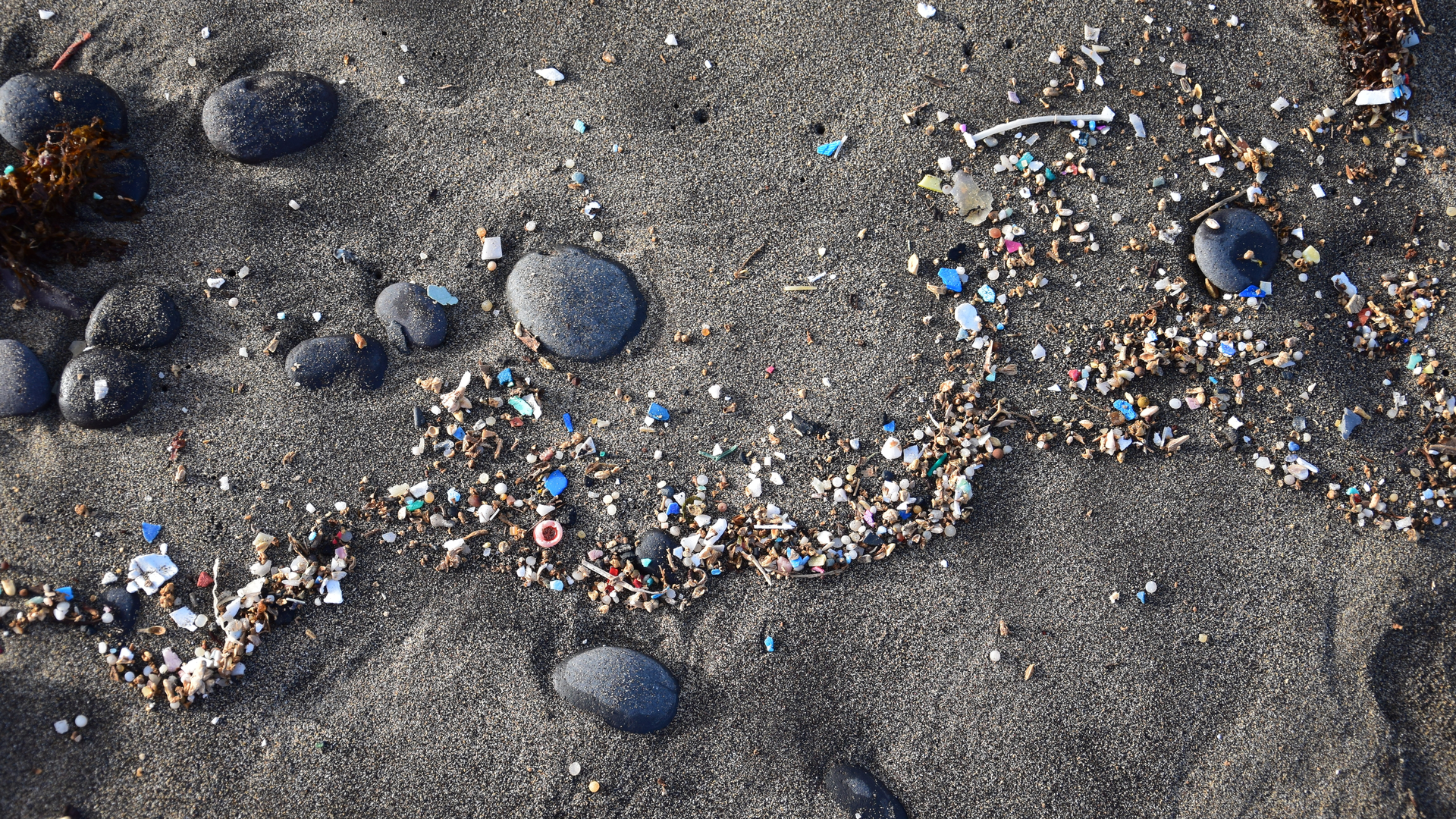 Microplastics that were fragmented from larger plastics are called secondary microplastics; they are known as primary microplastics if they originate from small size produced industrial beads, care products or textile fibers.