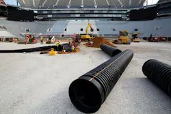 The system used 30-inch diameter mains and 2-inch diameter trunks along with a custom fabricated cross tee. The system used 30-inch diameter mains and 2-inch diameter trunks along with a custom fabricated cross tee.