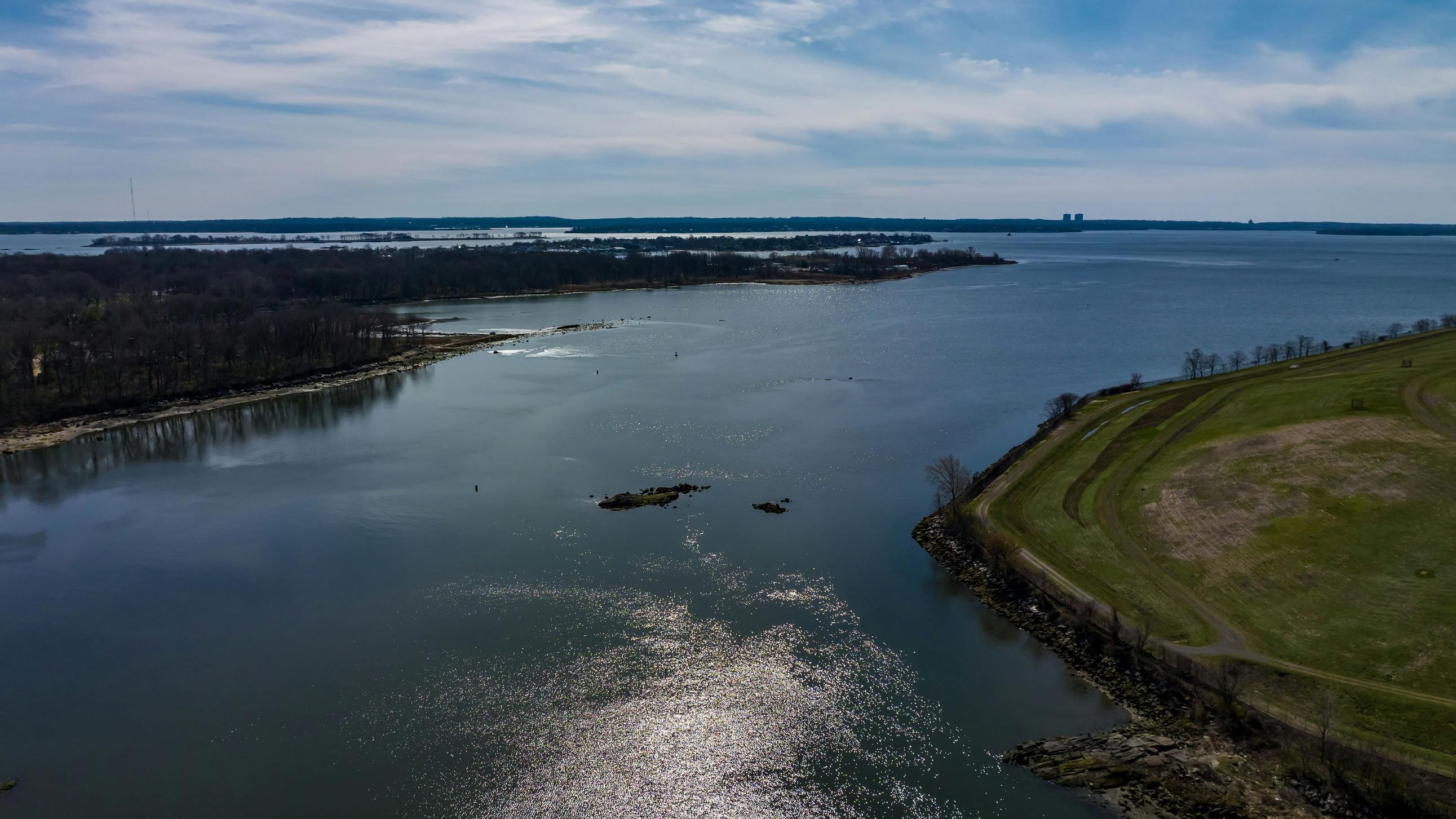 An aerial view of the Hutchinson River on a sunny morning in the Bronx, New York