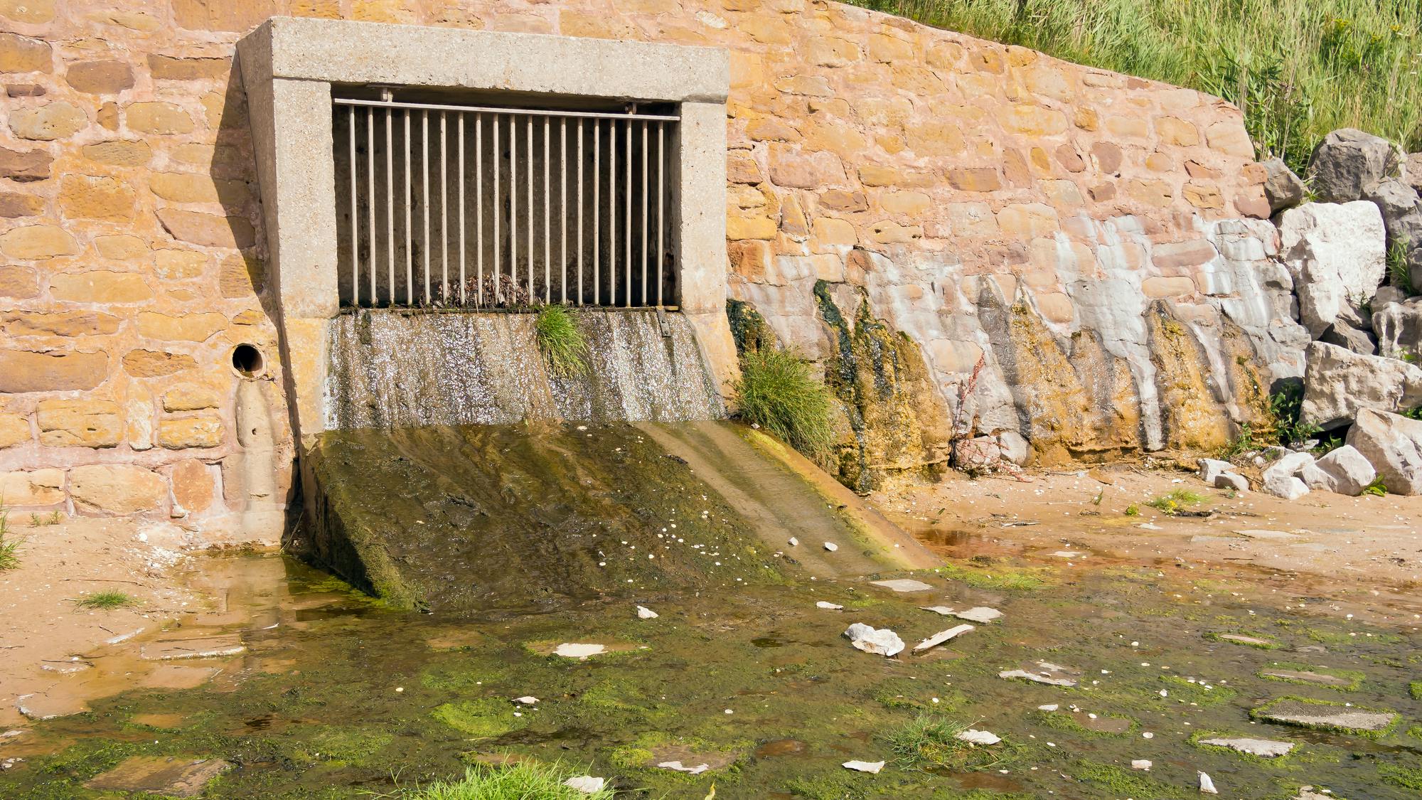 Storm drain outflow onto a beach