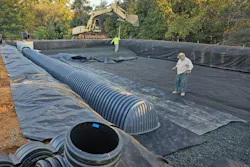 Warrenton Equipment owner Richard Varona checks out the first row of stormwater collection chambers. Warrenton Equipment owner Richard Varona checks out the first row of stormwater collection chambers.