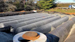 The underground stormwater collection chambers replaced an open basin to give Warrenton Equipment more parking area for its heavy equipment. The underground stormwater collection chambers replaced an open basin to give Warrenton Equipment more parking area for its heavy equipment.