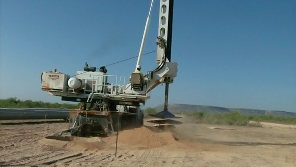 Irby Construction is using the 800 Auger Drill to set new poles on transmission