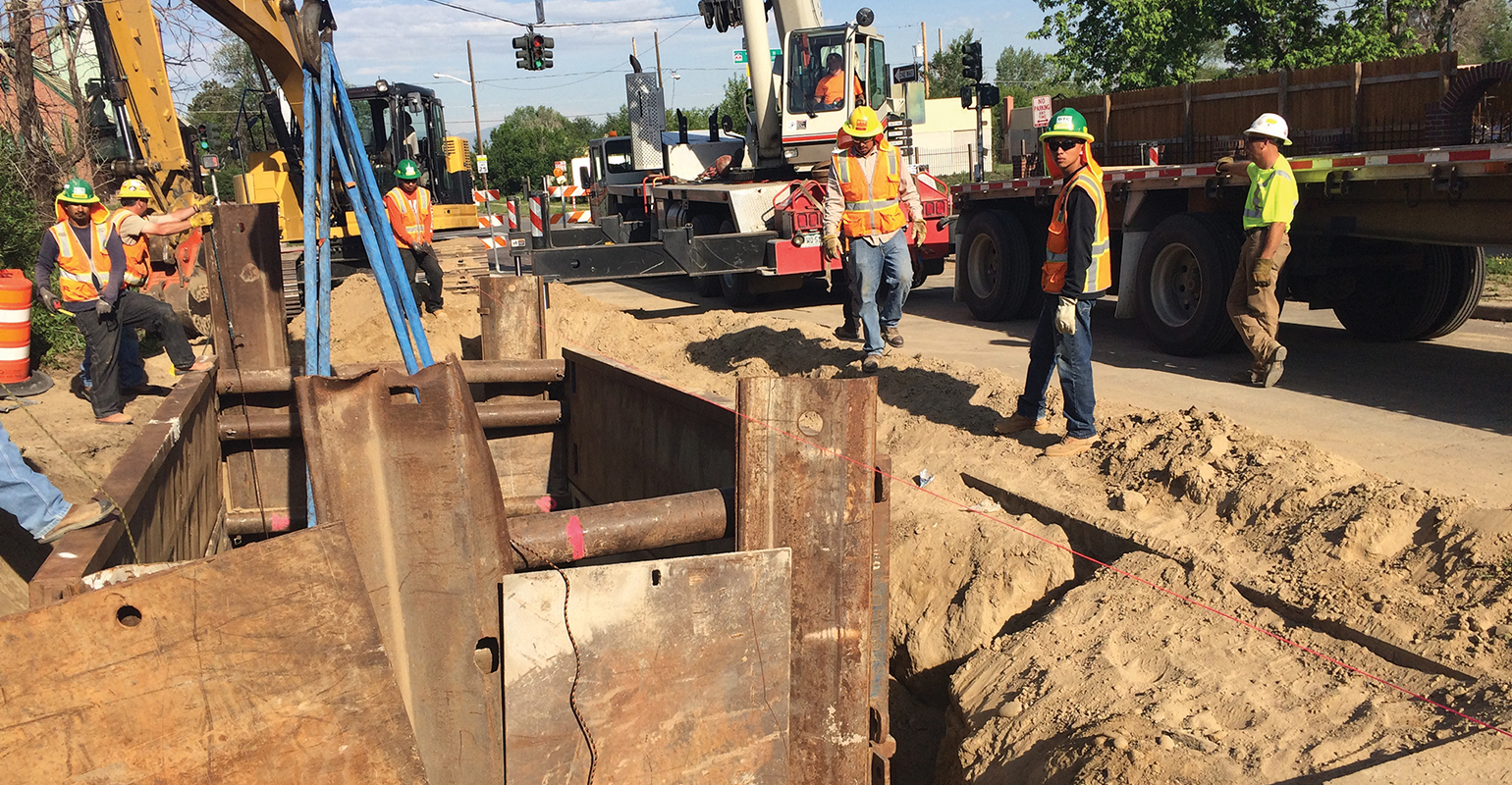 Crews install a vault using a cross-linked polyethylene (XLPE) cable system
