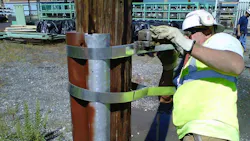 steel reinforcement to a wood pole steel reinforcement to a wood pole