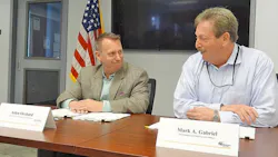SMUD General Manager and CEO Arlen Orchard left and Western CEO and Administrator Mark Gabriel prepare to sign an agreement to evaluate developing a new 500kV transmission project in Northern California If constructed the project could strengthen the local transmission grid and improve the energy import capability into the Sacramento area Photo by Caralee Stevens SMUD General Manager and CEO Arlen Orchard left and Western CEO and Administrator Mark Gabriel prepare to sign an agreement to evaluate developing a new 500kV transmission project in Northern California If constructed the project could strengthen the local transmission grid and improve the energy import capability into the Sacramento area Photo by Caralee Stevens