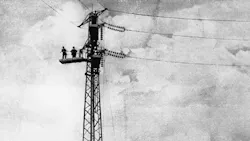 Black and white photo of early electrical power supply workers Black and white photo of early electrical power supply workers