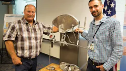 Rocky Mountain foreman III lineman Ron Burbridge and headquarters civil engineer Cody Neyens with the Burbolifter a device developed and fabricated by Burbridge that allows crews to lift optical ground wire without the use of a jib crane Now crews can use a helicopter for optical ground wire hardware replacement instead of a bucket truck and increase productivity by 500 Rocky Mountain foreman III lineman Ron Burbridge and headquarters civil engineer Cody Neyens with the Burbolifter a device developed and fabricated by Burbridge that allows crews to lift optical ground wire without the use of a jib crane Now crews can use a helicopter for optical ground wire hardware replacement instead of a bucket truck and increase productivity by 500