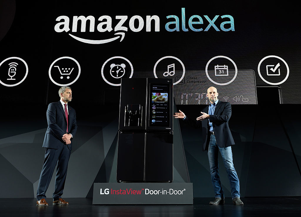 LG Electronics USA Vice President of Marketing David VanderWaal L and Amazon Vice President of Alexa Echo and Appstore Mike George display the LG Smart InstaView DoorinDoor refrigerator during a LG press event for CES 2017 at the Mandalay Bay Convention Center on January 4 2017 in Las Vegas Nevada CES the world39s largest annual consumer technology trade show runs from January 58 and is expected to feature 3800 exhibitors showing off their latest products and services to more than 165000 attendees