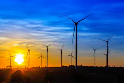wind turbines at sunset wind turbines at sunset