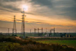 An electricity substation in the countryside at sunrise. An electricity substation in the countryside at sunrise.