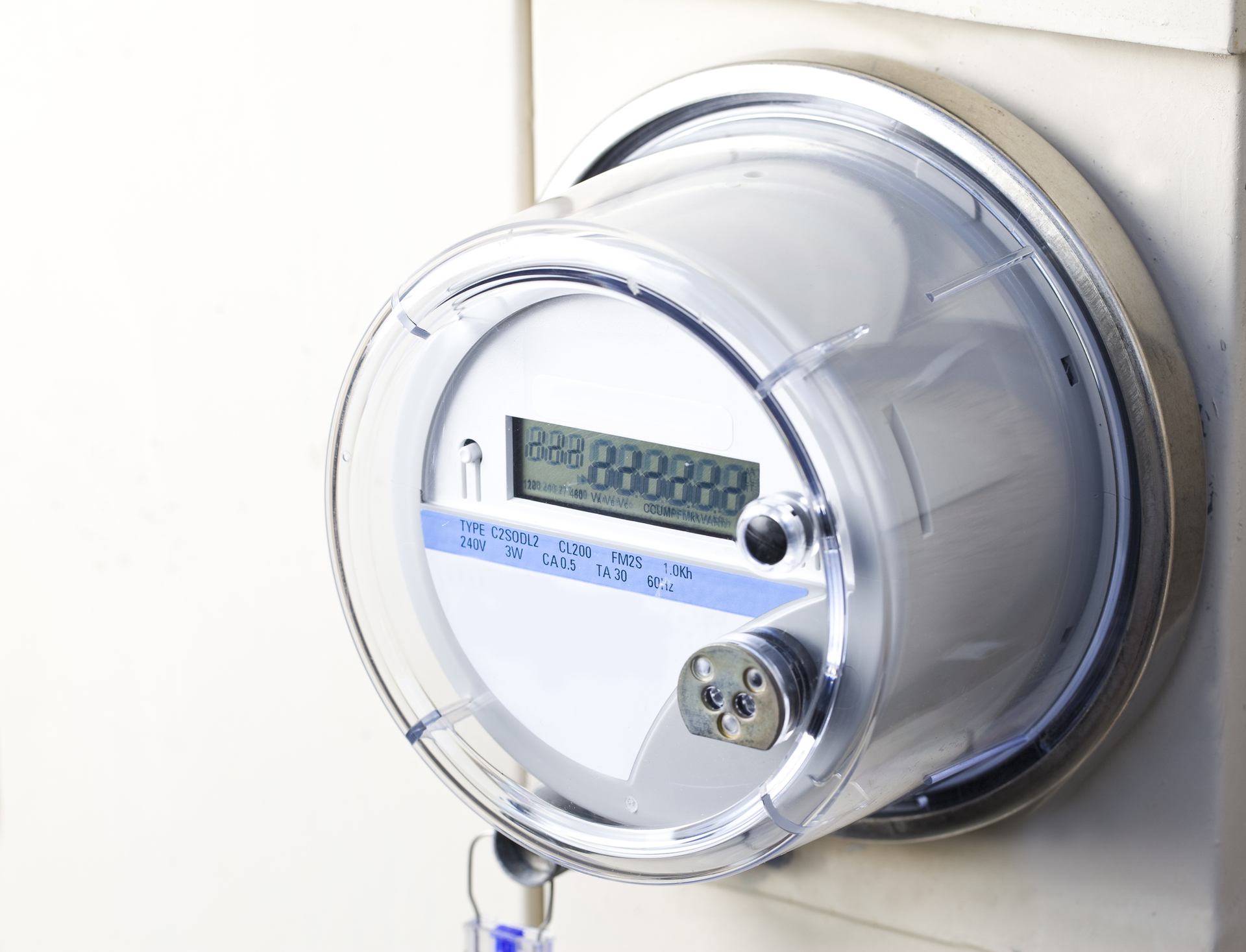 Smart meter on wall of home.
