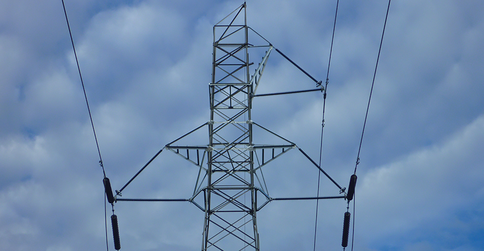 Refurbished transmission line showing replacement akimbo crossarms