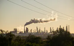 A power plant emitting smoke A power plant emitting smoke