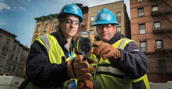 Con Edison staff examining images on IR camera Con Edison staff examining images on IR camera