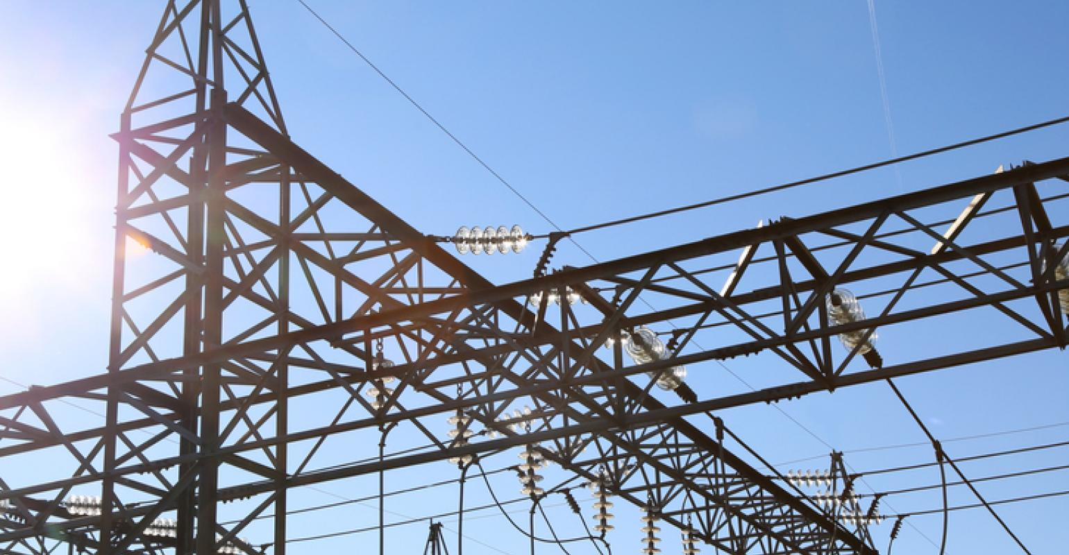 Electric transmission tower and overhead power lines