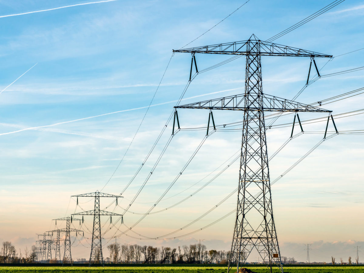 Electric transmission towers and overhead lines