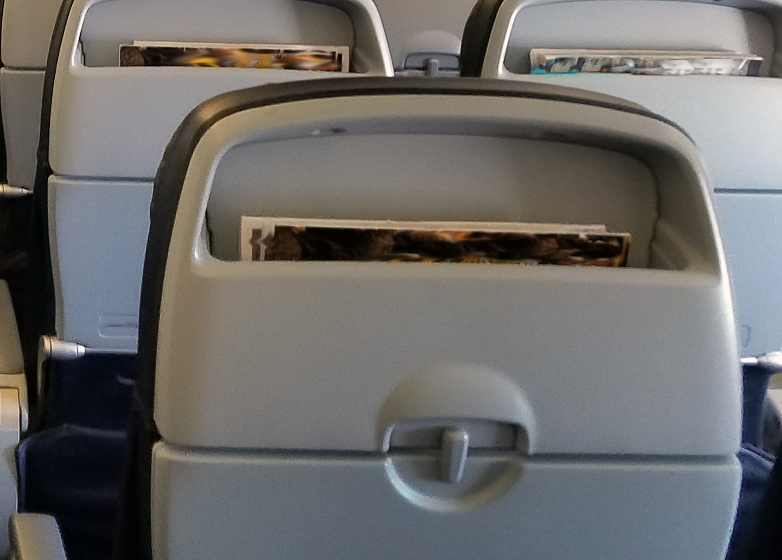 Empty seatback on an airplane