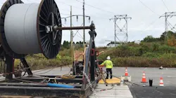 A utility worker and equipment A utility worker and equipment