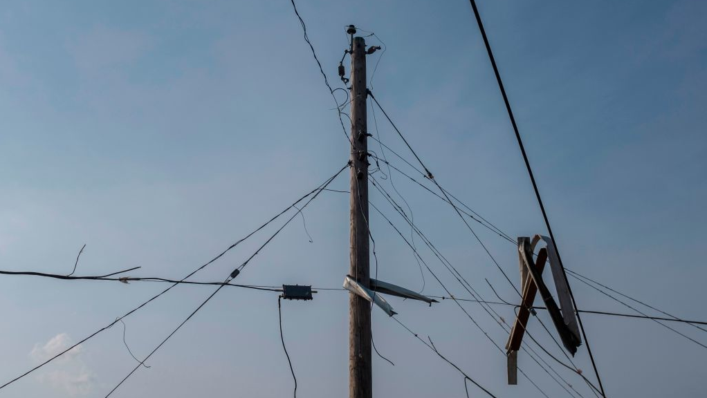 Downed power lines are seen in Dayton, Ohio, on May 28, 2019, after powerful tornadoes ripped through the US state overnight, causing at least one fatality and widespread damage and power outages.