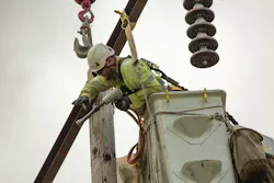 BPA line crews work to replace transmission components on a line north of Salem, Oregon. BPA line crews work to replace transmission components on a line north of Salem, Oregon.