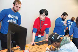ComEd engineer mentors a STEM program student through project development. ComEd engineer mentors a STEM program student through project development.