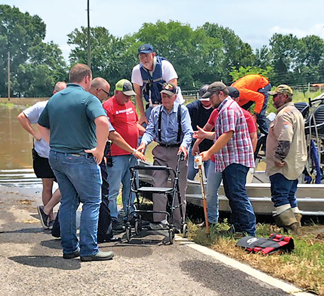 Entergy's employees assisted a customer using an airboat following a flood.
