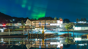 The aurora borealis appears over Cordova's town center. About 2,300 people live in the town year-round.