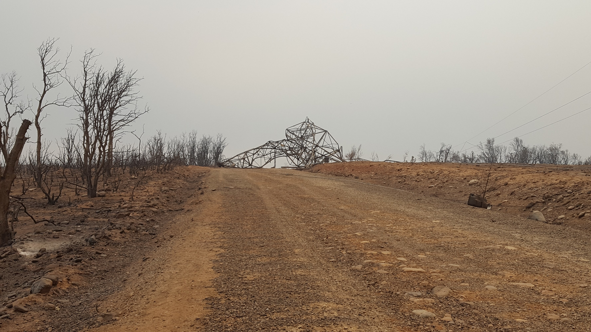 This steel lattice tower on the Shasta-to-Cottonwood #2 transmission line near Keswick Dam in Redding, California, was destroyed during the Carr Fire that raged through Shasta and Trinity Counties in July and August 2018.