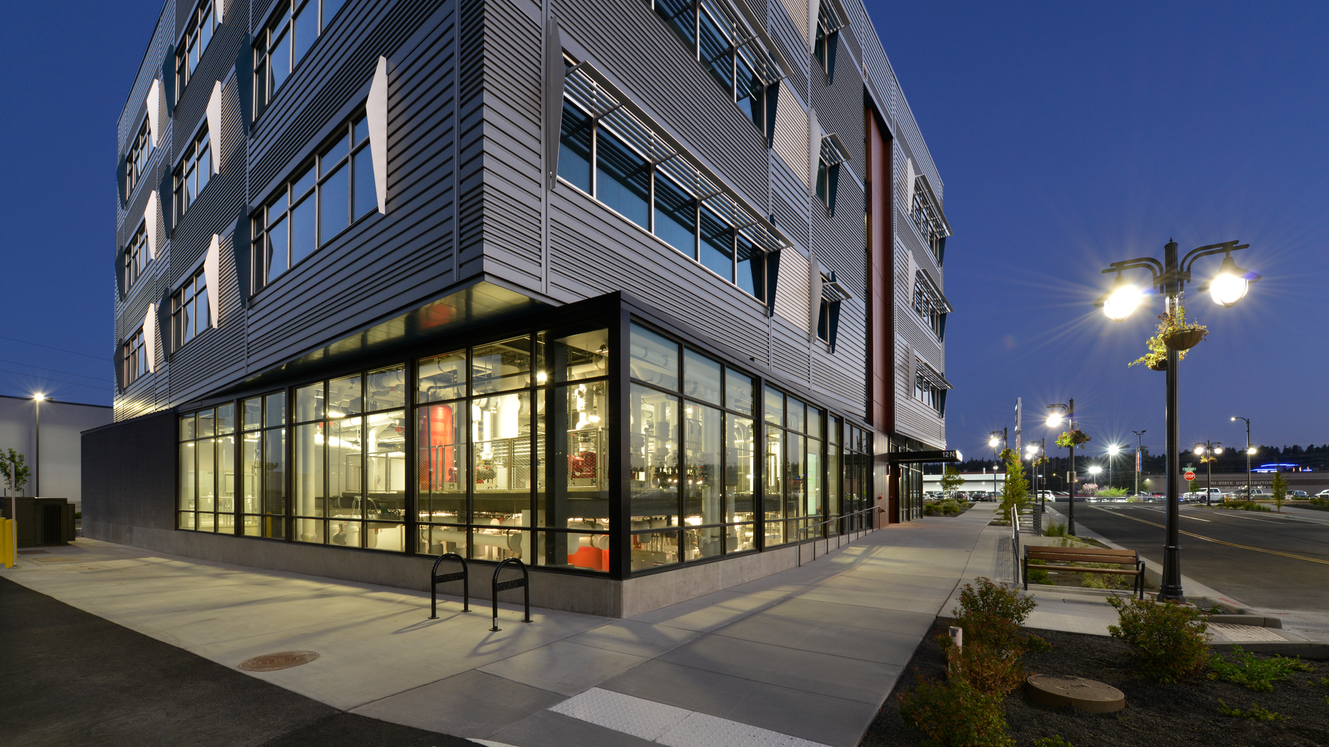The Central Energy Plant located in the Scott Morris Center for Energy Innovation is visible through windows to help build awareness about the Eco-District that provides energy to Catalyst and the Morris Center.