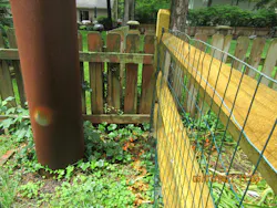 Very tight quarters: Proximity to fences and structures make access very difficult Very tight quarters: Proximity to fences and structures make access very difficult