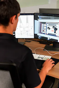 A developer works on a mobile app that helps substation technician apprentices visualize substation components. A developer works on a mobile app that helps substation technician apprentices visualize substation components.