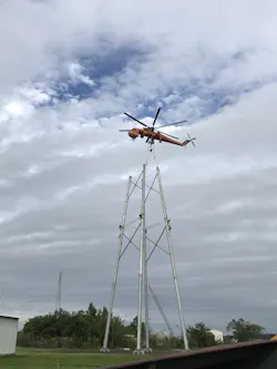 A heavy-lift helicopter, the Erickson Air Crane, was used to set the poles for the transmission structures which were built in sections. A heavy-lift helicopter, the Erickson Air Crane, was used to set the poles for the transmission structures which were built in sections.